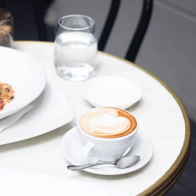 A latte on a café table